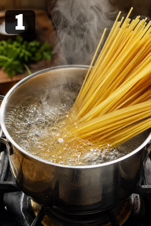 Spaghetti boiling in salted water until al dente for an easy garlic pasta dinner
