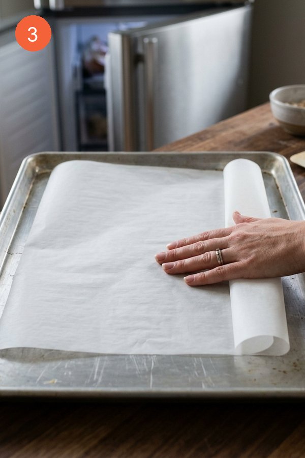 lining baking sheet with parchment paper for freezing