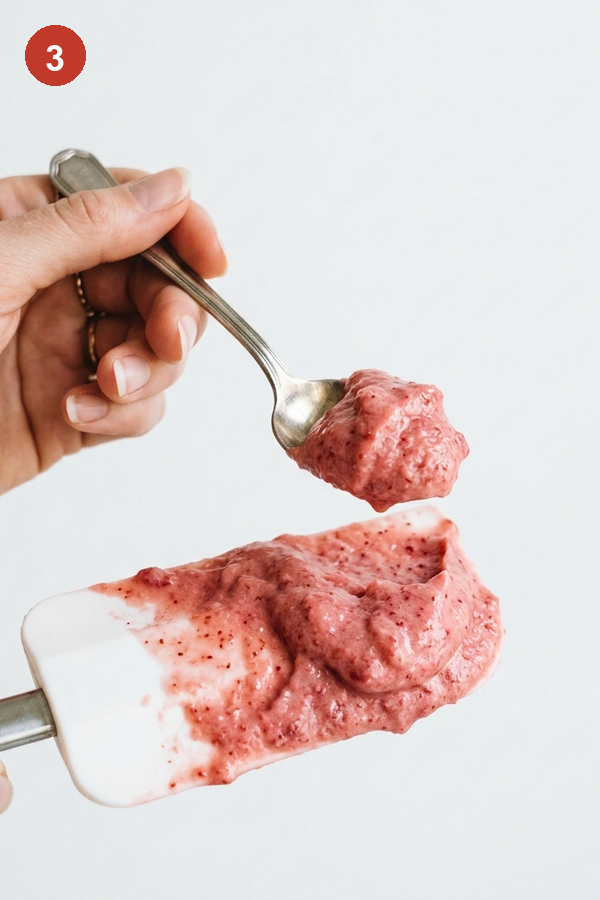 tasting frozen strawberry dole whip mixture on spatula